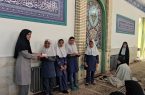 تجلیل از دانش‌آموزان برگزیده شهرستان اشکذر در جشنواره کتابخوانی رضوی